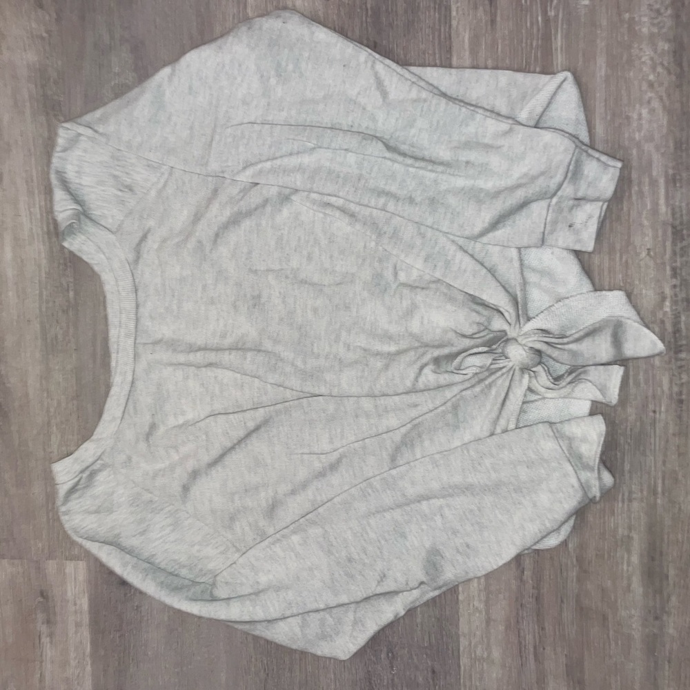 Long sleeve with bow at the bottom, size small